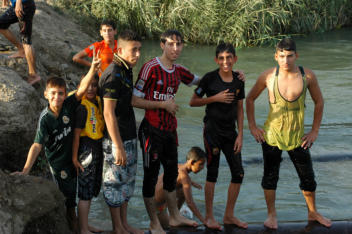 Waiting their turn to jump in the water