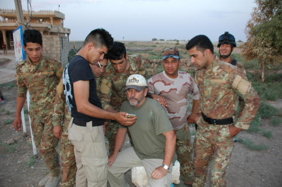 The guys showing me videos on their phones of the battle for Dholoyia from last year.
