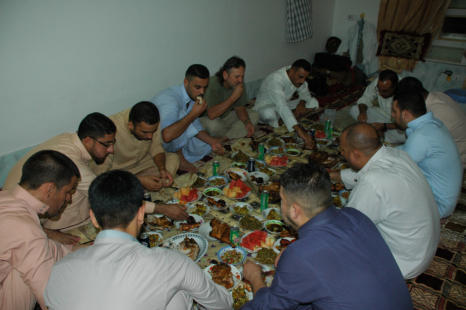 Enjoying the meal with the students.